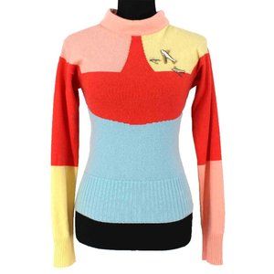 chanel orange sweater